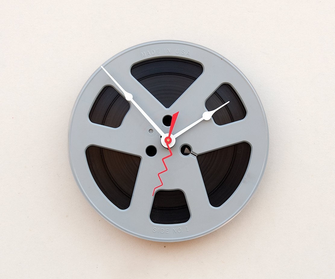 Clock made from a recycled magnetic tape reel