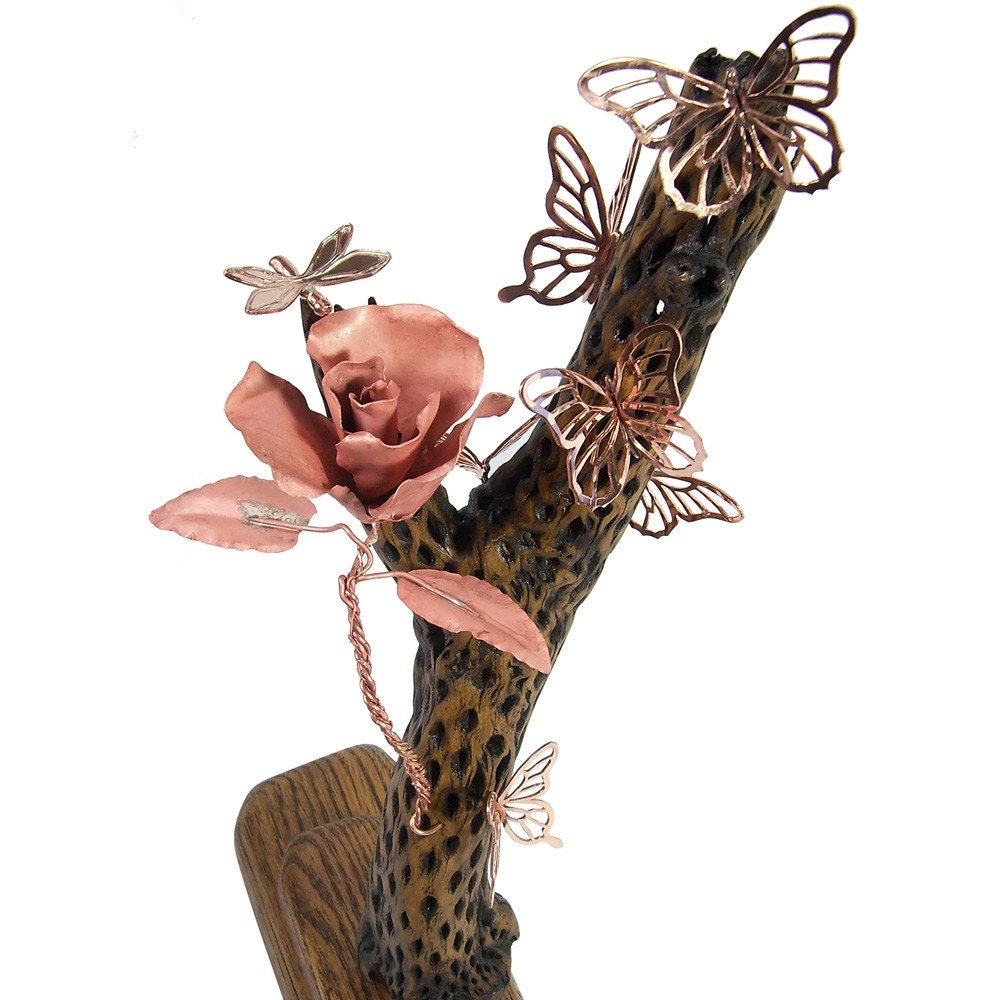 The Intruder, Butterfly Sculpture with a hornet and a rose