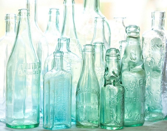 antique bottles no. 3... sunlight through blue green glass by leaping gazelle