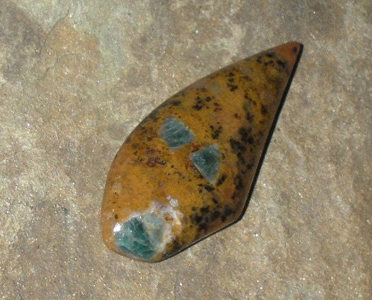 Blue Eyes Crying In The Flame ... Petrified Wood Opal ... Screaming Even ... CAB ... 45mm taLL ... Gnome Stone