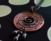 Copper Swirl Circle Pendant Necklace with Bead drops.