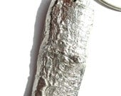 Textured 'bark' silver pendant