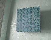 Astrobot Brigade in blue grey, hand screen printed on wood by robotyardsale