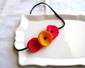 pomegranate-orange sherbert poppy garland headband.
