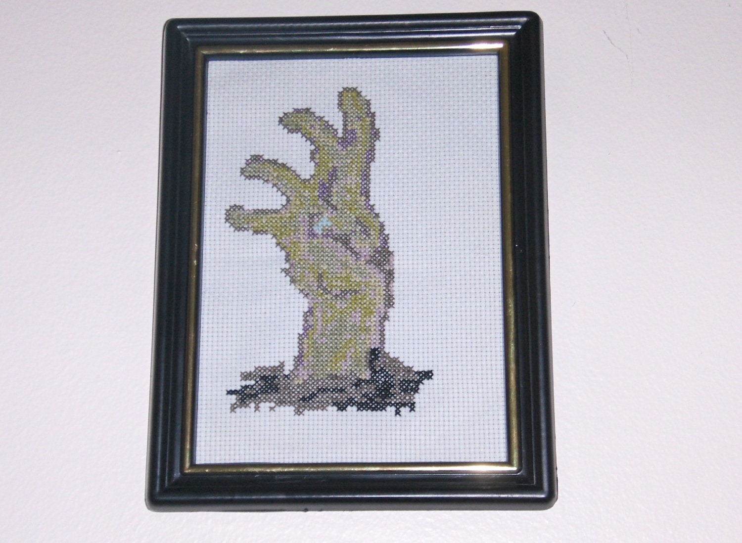 It's Coming to get you - Cross Stitched Zombie Hand Framed Picture