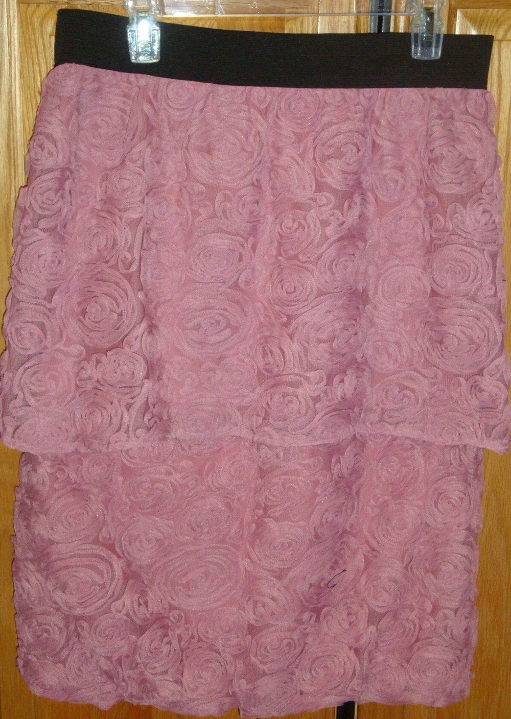Dusty pink "roses" skirt with black elastic waistband.