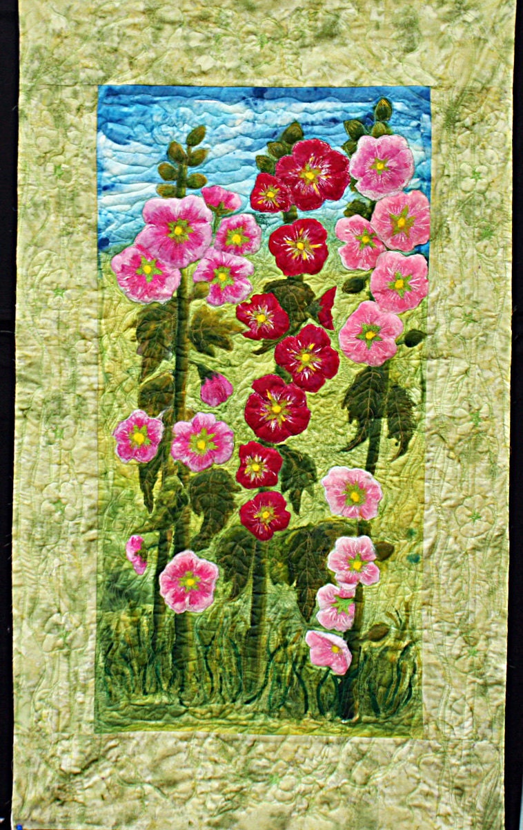 art quilt, applique hollyhocks in pink and fuchsia