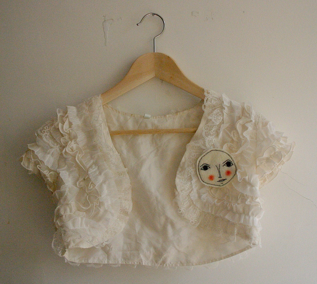 Face brooch