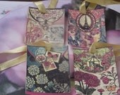 Gift    Tags   With     Pastel   Color  Flowers   IN  Vintage  Rose, Green, and  Red, Butterfly ,Eiffel Tower,And french writing  backgr