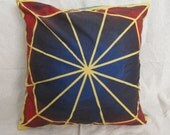 Blues and reds starburst pillow cover