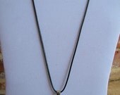 Metal Rhinestone Football Pendant on a Leather Rope Necklace