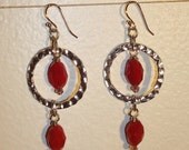 Silver hoops and magenta crystal stones