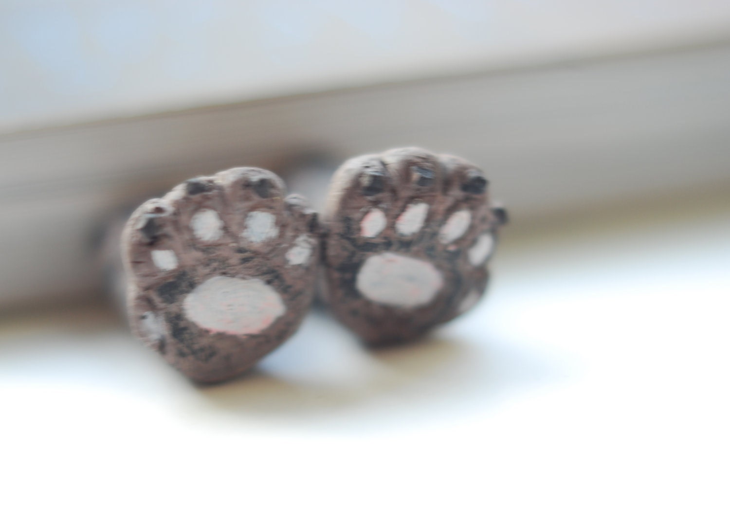Cats paws in the book. Unusual art bookmark, halloween gift idea