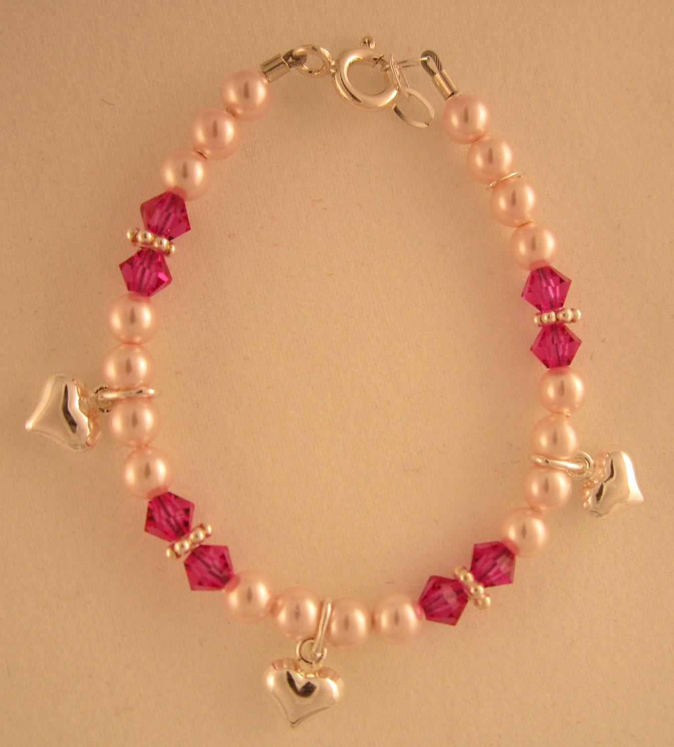 Pink Pearls and Red Crystals with Puffy Hearts baby bracelet (BPF)
