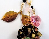 Vintage charm necklace with swarovski crystal heart, leaf spray charm and black beaded vintage earring converted into the pretty focal point