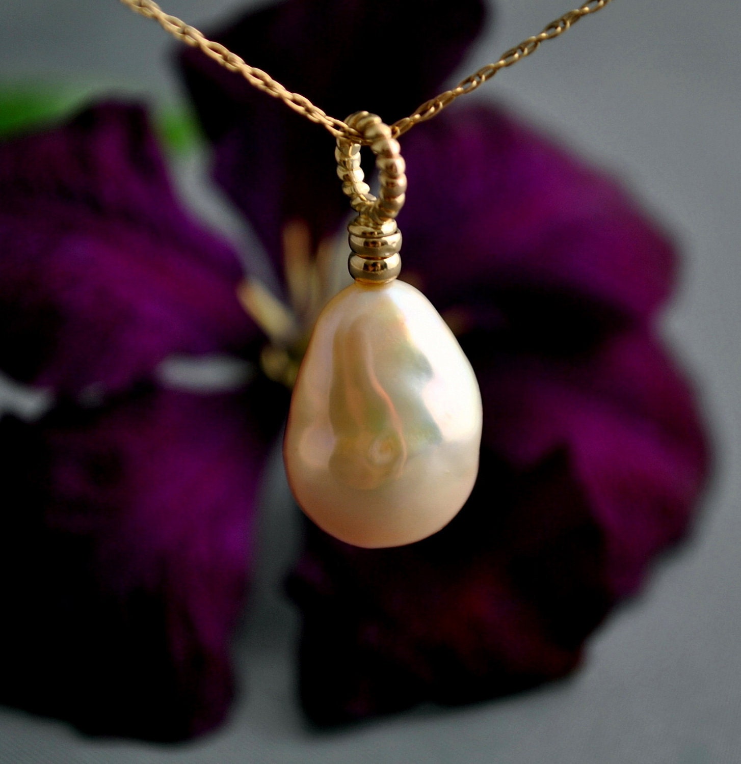 Sula- the large ripe apricot nucleated baroque drop solitaire pearl pendant set in solid 14kt yellow gold - not plated