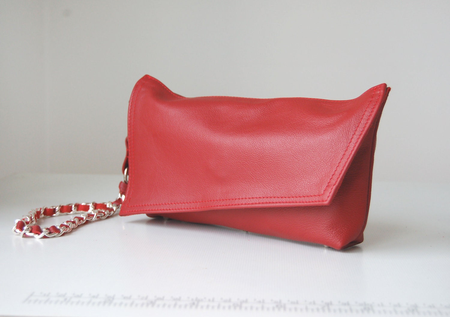 Suzette, red leather clutch bag, handmade.