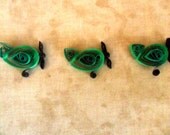 3 Green Paper Quilled Airplanes