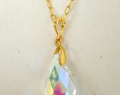 Beautiful swarovski crystal teardrop shaped briolette elegantly dropping from a delicate chain with crystal studded ball clasp