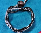 Variegated Black Thread Bracelet