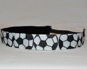 Band-It Headband.... Soccer Ball.  Will stay put and not slip.