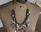 Free US and Canada shipping - On Stranger Tides, Pirate Talisman. Seashell, Shark Bone, sword  Necklace Free Matching earrings