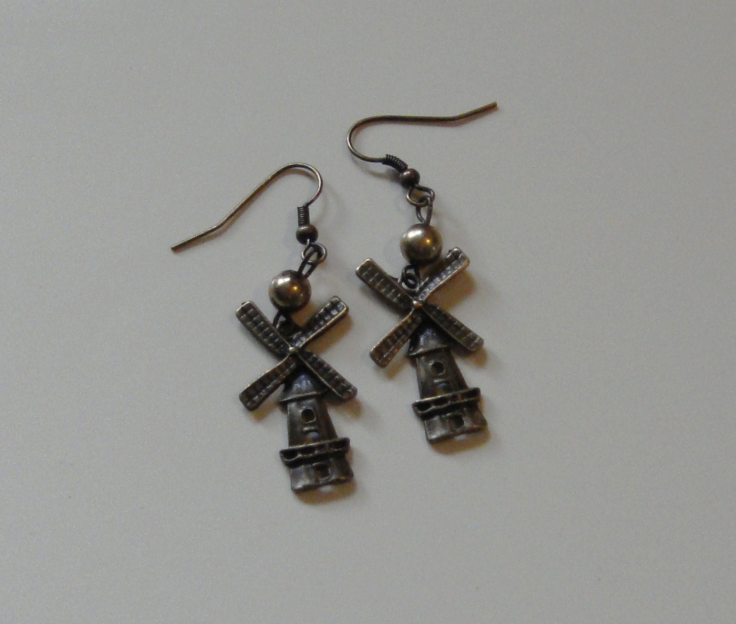Antique style windmill charm earrings with brass-tone connectors