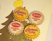 Set of 4 Vintage Bottle Caps Golden Pioneer Valley Ginger Ale and Nesbitts Strawberry Soda