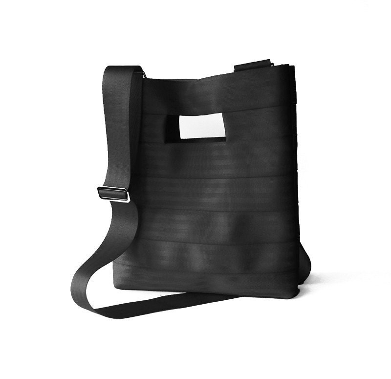 The Hyphen PLUS in Black - Black Seatbelt Clutch Purse