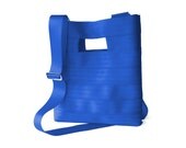 The Hyphen PLUS in Blue - Blue Seatbelt Clutch Purse