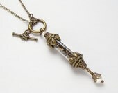 Steampunk Necklace antique watch parts gears vintage glass vial time in a bottle genuine pearl gold brass leaf by Steampunk Nation R1048