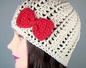 Cabled Beanie Hat in Cream with Red Bow