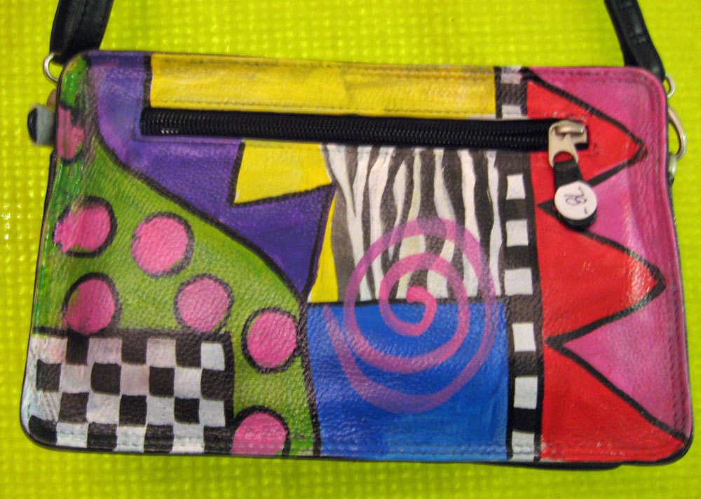 Hand painted leather purse with attached sunglass holder and shoulder strap