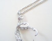 chrome blasted claw necklace