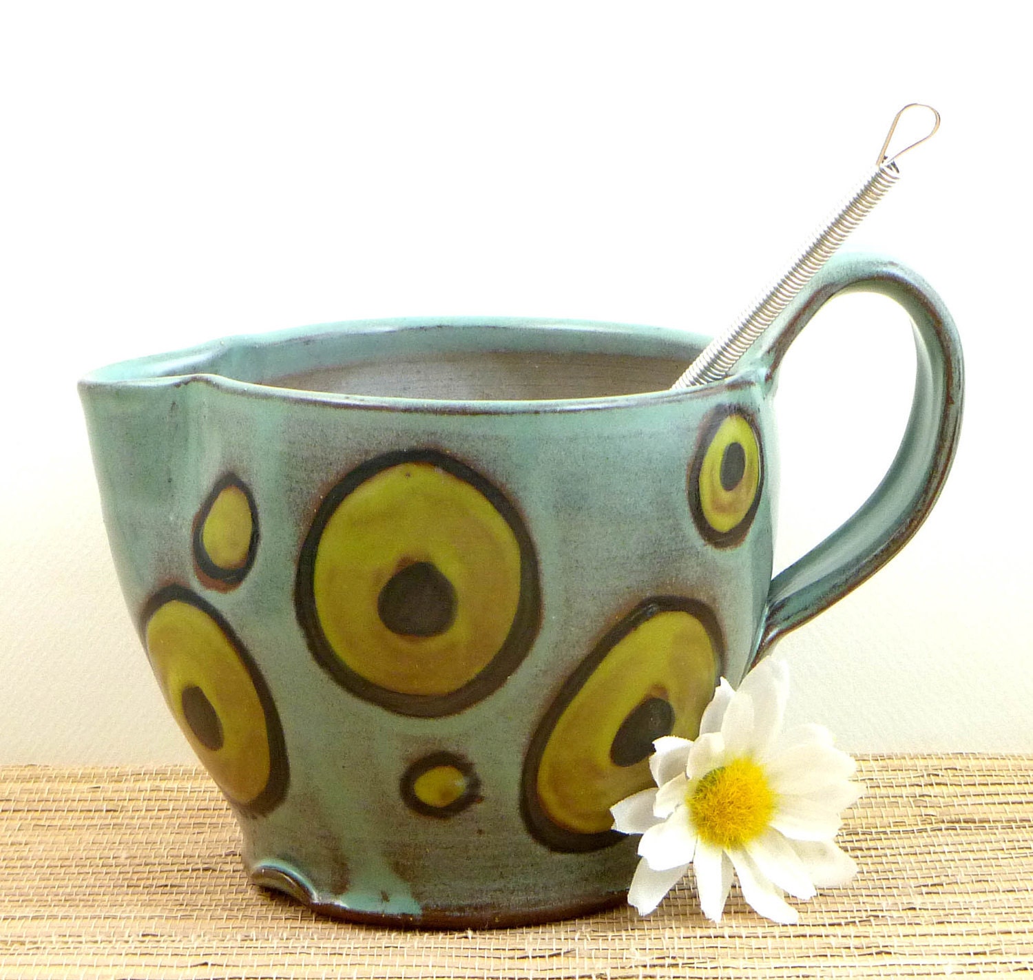 Stoneware pottery mixing bowl with whisk