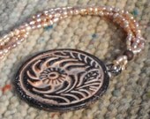 Ceramic Abstract Circle Necklace with Pearlescent Beads