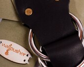 leather guitar strap in green on black