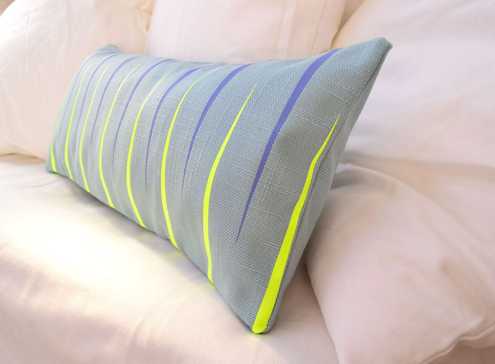 Teal blue modern decorative pillow with neon yellow details