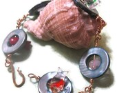 Colorful Glass Fish and Teal Shell Donuts Bracelet