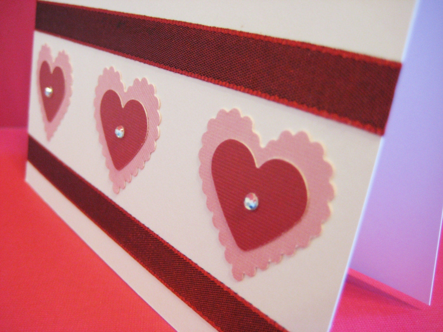 Valentine card, red, pink and ivory scalloped hearts