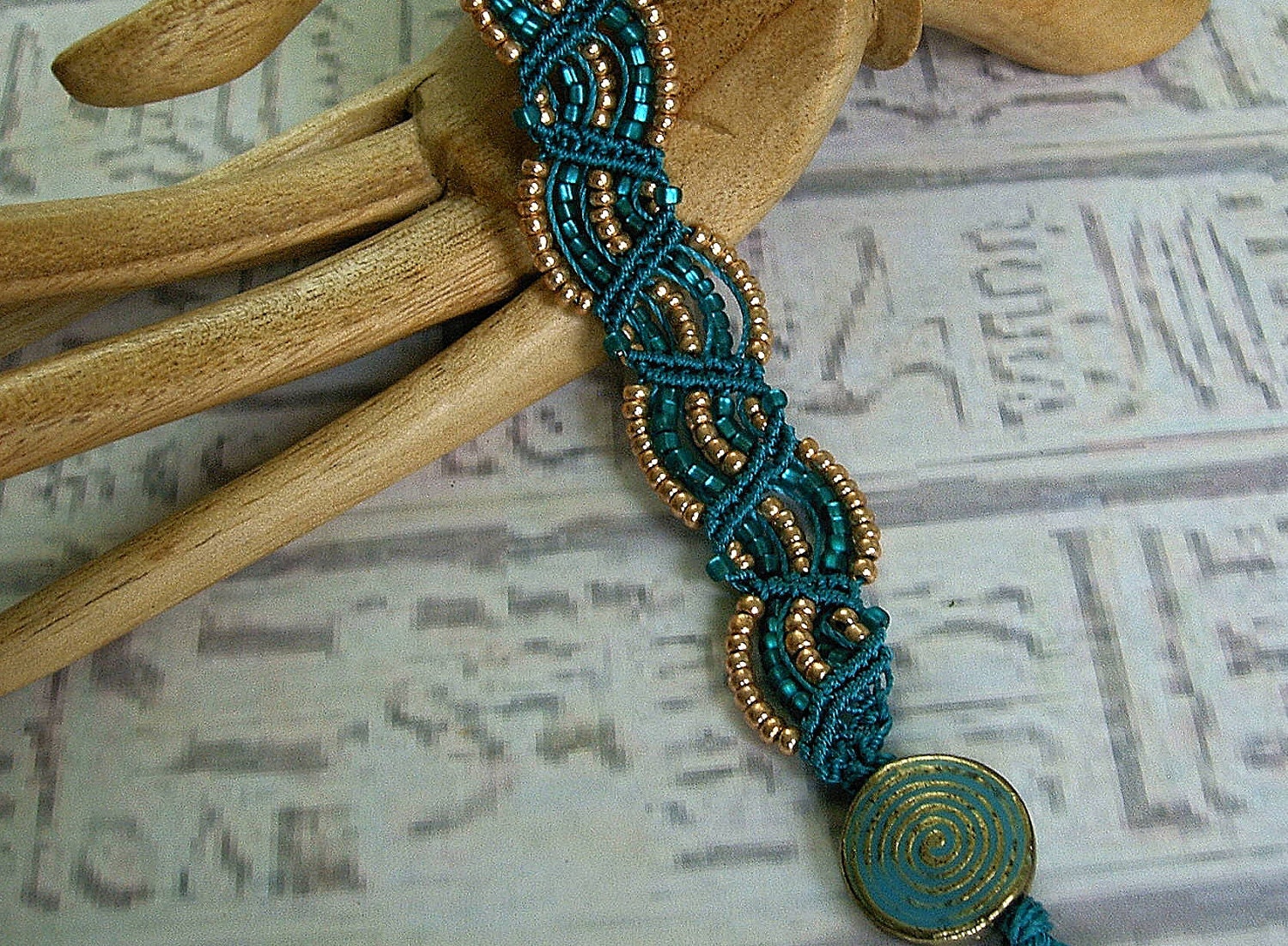 Beaded Micro macrame bracelet in teal and copper.