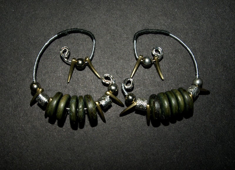 Wood, brass, and silver ear weights