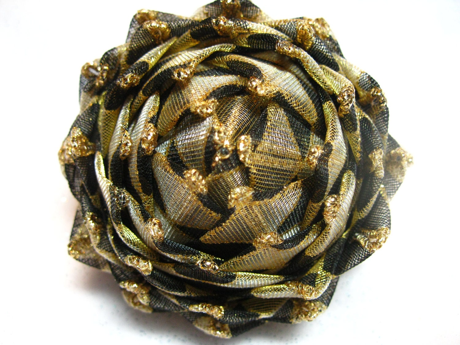 gold and black Christmas ornament, pine cone