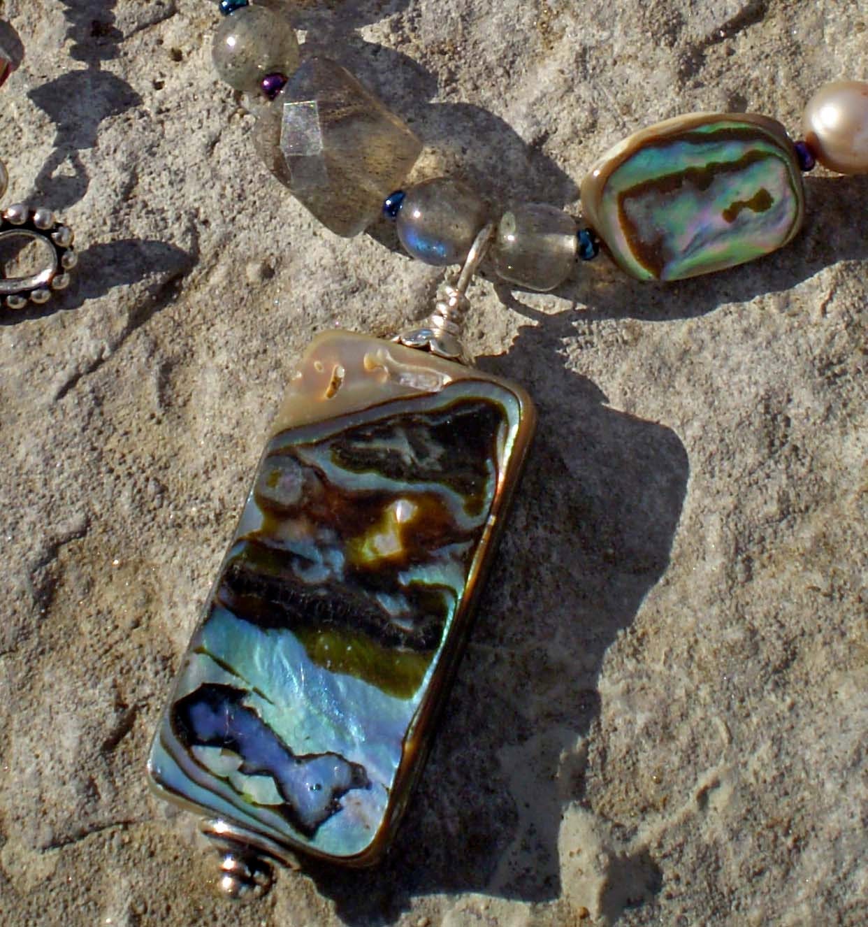 Quirky Assymetrical beaded necklace with abalone pendant