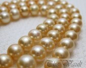 6-7mm soft orange off round pearl strand 16 inches