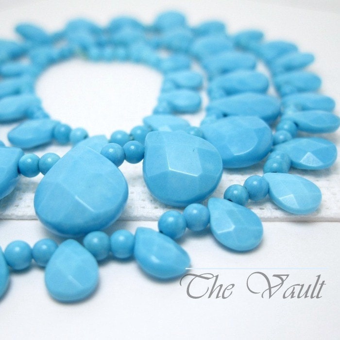 Strand  Turquoise 7-12mm graduated briolette and bead strand
