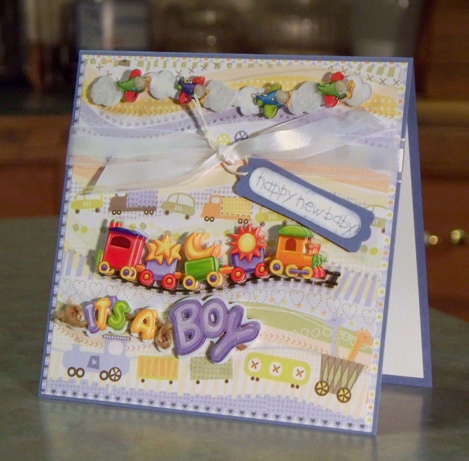 New Baby Boy Card with 3-D Train, Airplanes & Clouds