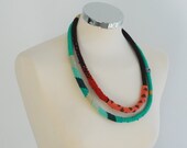 long textile beaded necklace