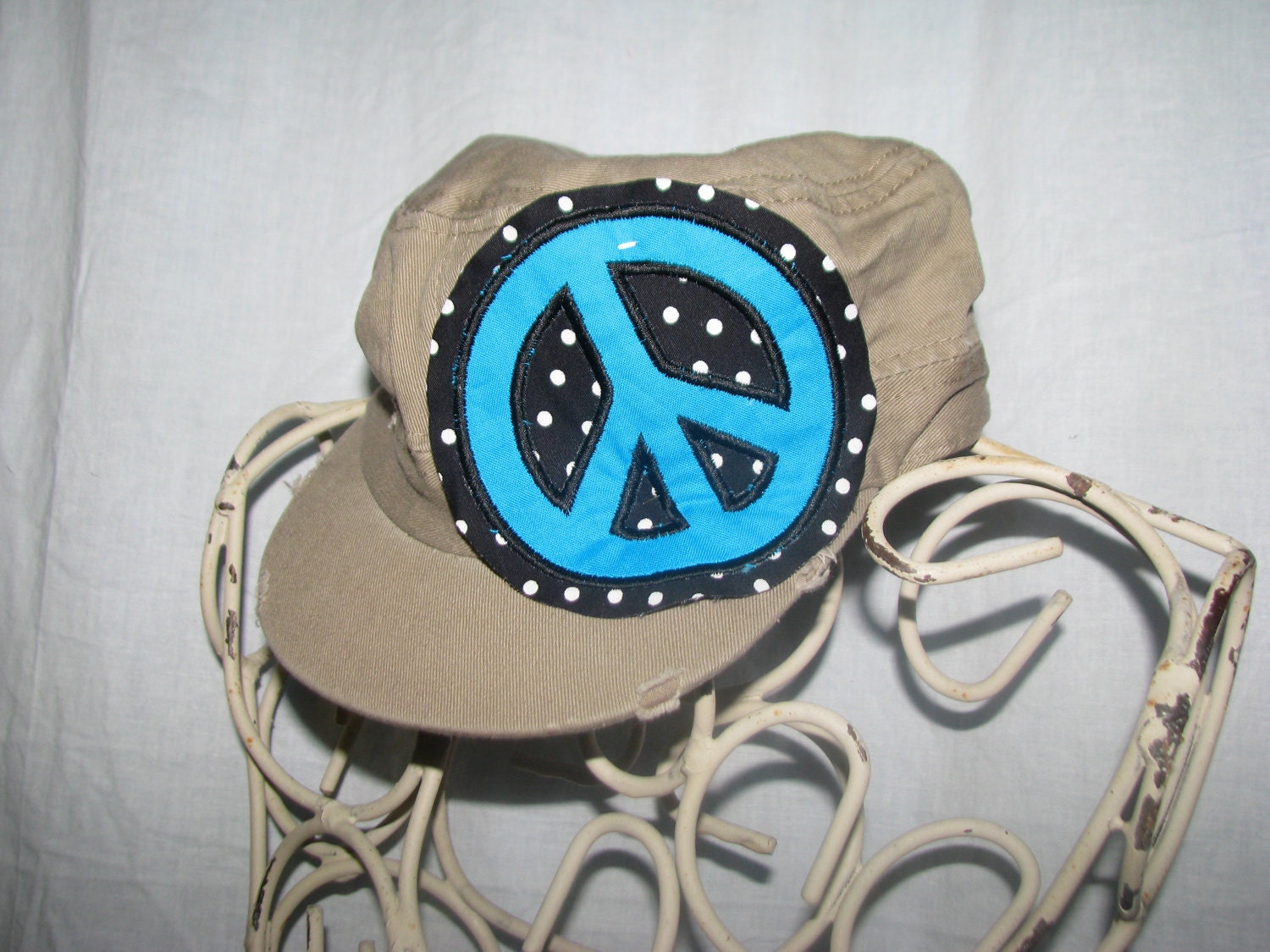 Interchangeable kids military style cadet cap with peace sign applique