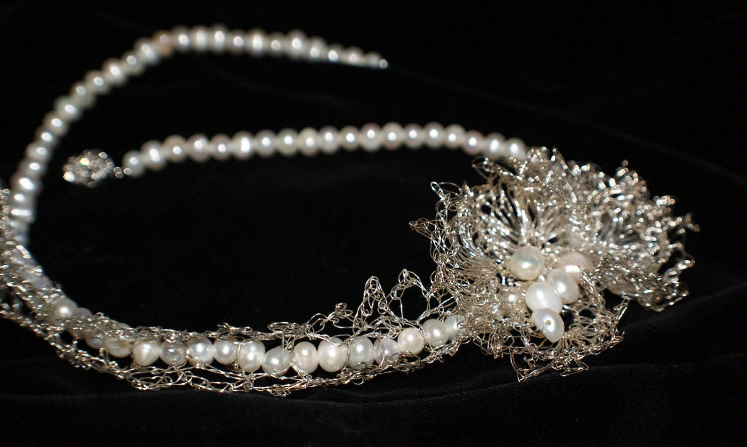Elegant bridal freshwater pearl necklace with unique hand chroched silver orchid